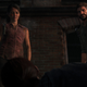 Tess and Joel are seen standing over Robert, who is lying on the ground beaten down.